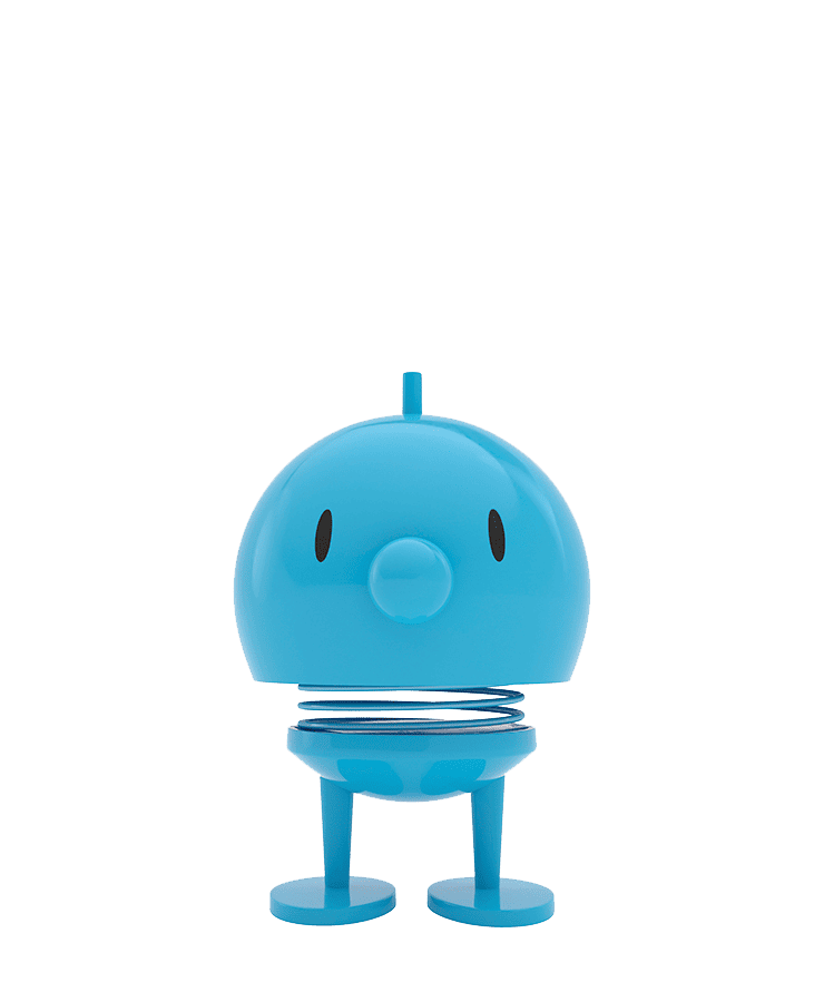Der Hoptimist Bumble Medium Turquoise von Hoptimist ist ein kleines, rundes Spielzeug mit einem türkisfarbenen, kuppelförmigen Kopf, ovalen Augen, einer schnabelartigen Nase und einem federnden Körper auf flachen Füßen – das mit seinem fröhlichen Design Optimismus verbreitet.